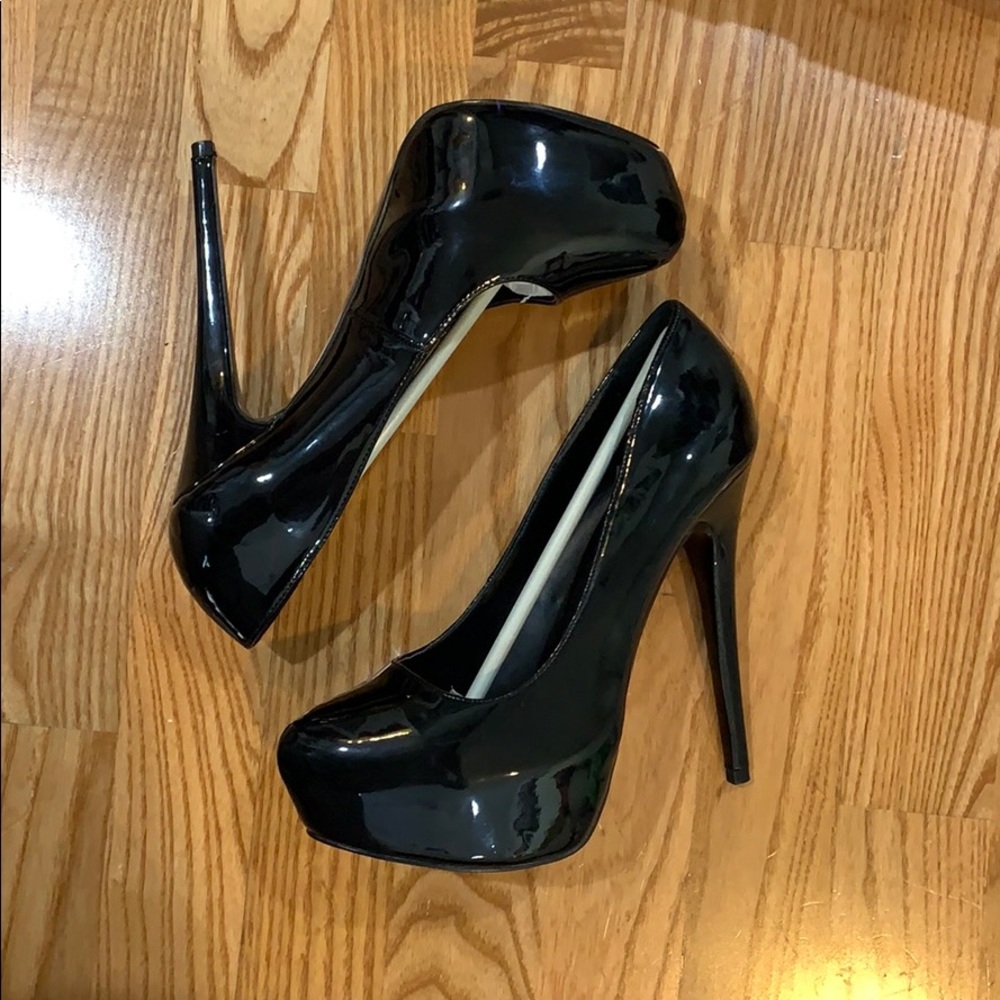 Aldo Black Heels. Basically new. Worn one time.